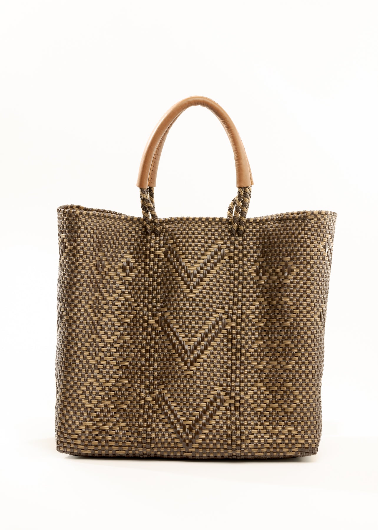 Brown and tan chevron woven bucket bag made from recycled plastics and featuring a tan leather handles